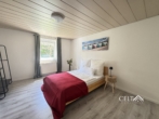 Schlafzimmer - Doppelhaushälfte mit Renovierungsbedarf in urbaner Lage – bis zu 70% KfW-Förderung